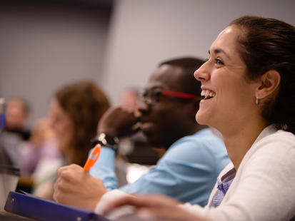 Students attending class at UVA Darden School of Business